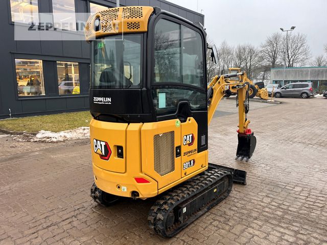 2024 Caterpillar 301.8 mini excavator, rear three-quarter view