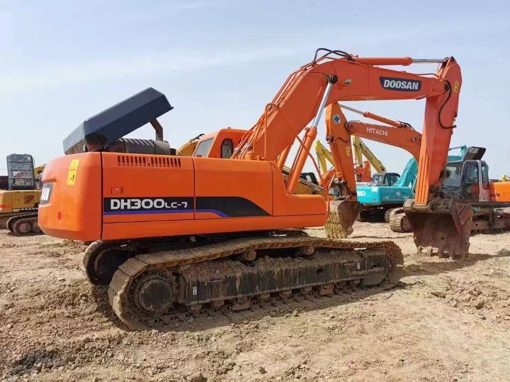 2022 Doosan DH300LC-7 crawler excavator, rear three-quarter view 2022 Doosan DH300LC-7 crawler excavator, rear three-quarter view