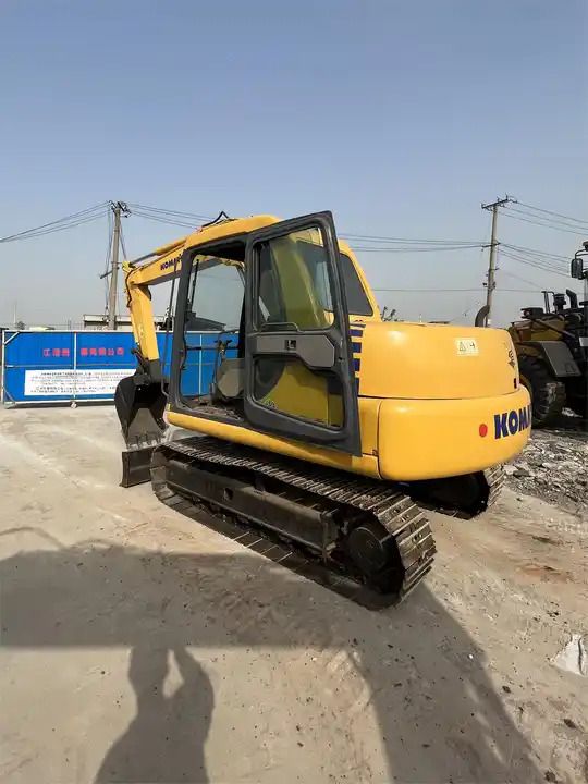 2016 Komatsu PC60-7 crawler excavator, rear three-quarter view 2016 Komatsu PC60-7 crawler excavator, rear three-quarter view