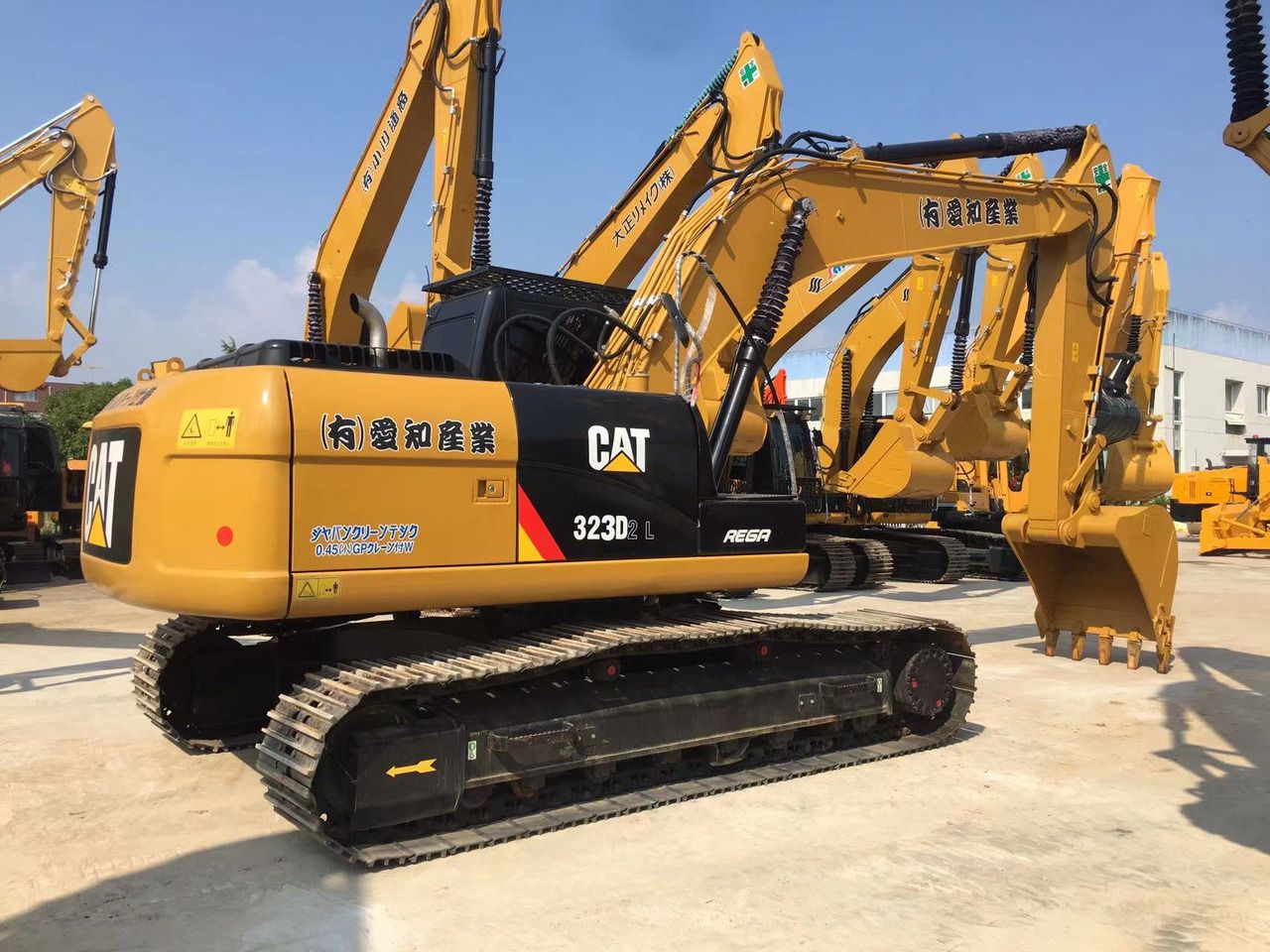 2022 Caterpillar 323D2L crawler excavator, rear three-quarter view 2022 Caterpillar 323D2L crawler excavator, rear three-quarter view