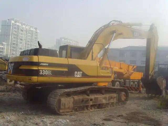 2016 CAT 330BL crawler excavator, rear three-quarter view