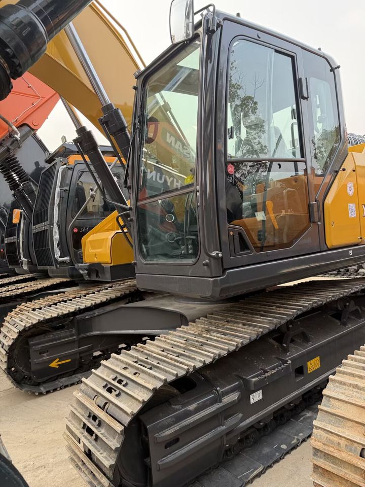 2026 XCMG XE215GA crawler excavator, close-up of cab and tracks