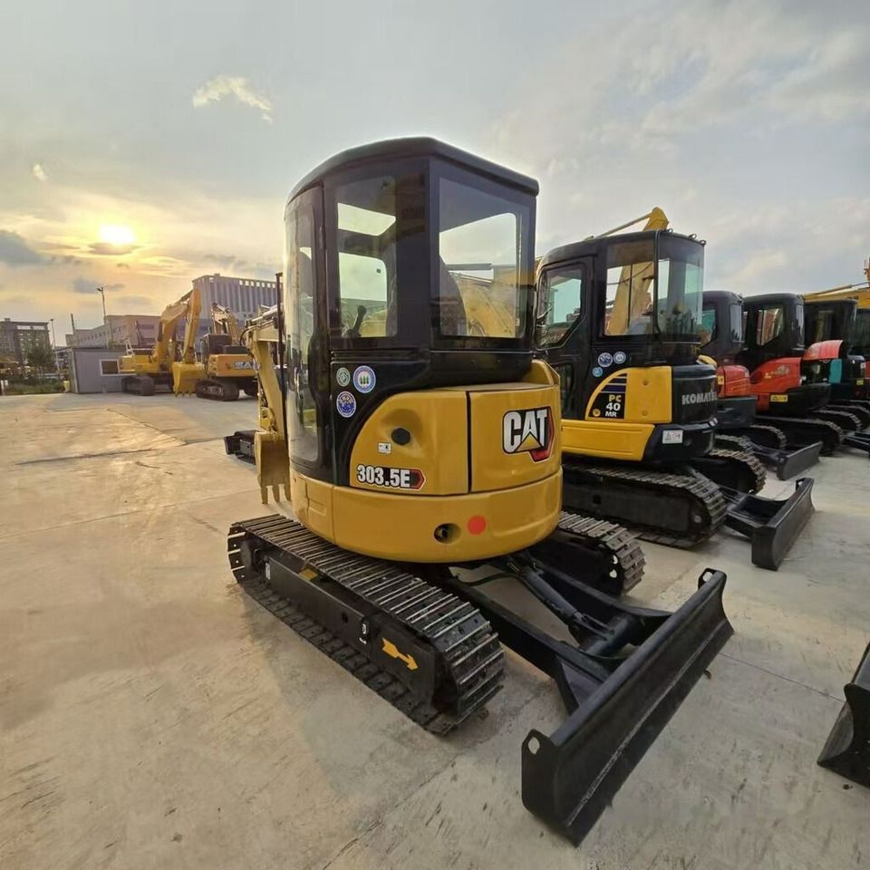 2024 Caterpillar 303.5E mini excavator, rear three-quarter view 2024 Caterpillar 303.5E mini excavator, rear three-quarter view