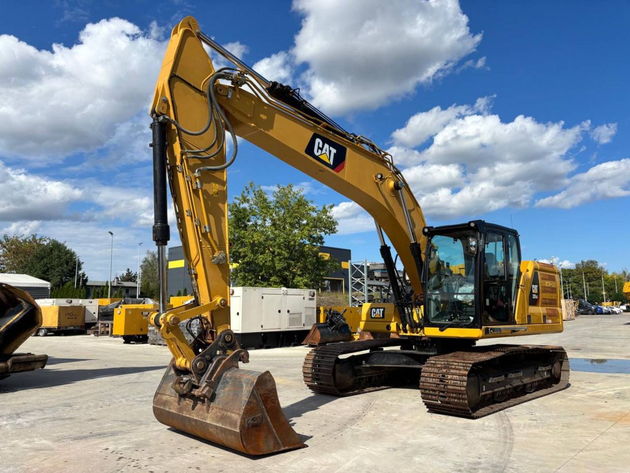 2022 Caterpillar 320GC crawler excavator, side profile view