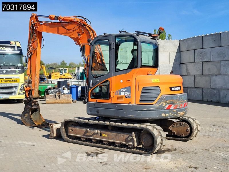 2019 Doosan DX85R-3 mini excavator, rear three-quarter view 2019 Doosan DX85R-3 mini excavator, rear three-quarter view