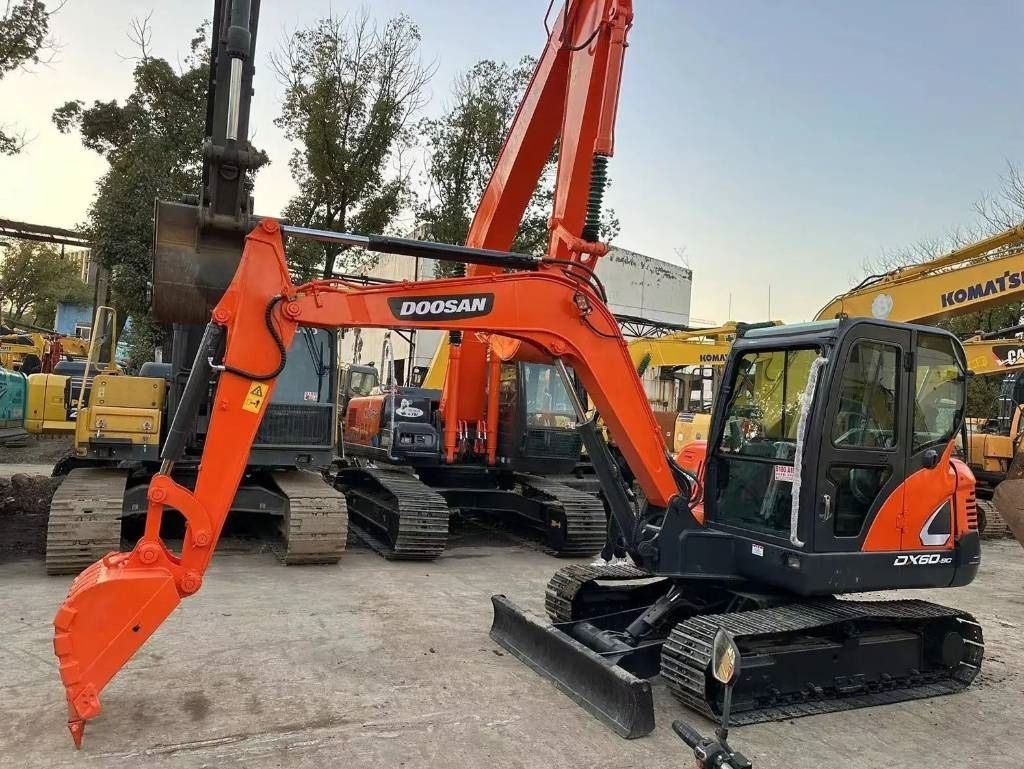 2022 Doosan DX60-9C mini excavator, side view 2022 Doosan DX60-9C mini excavator, side view