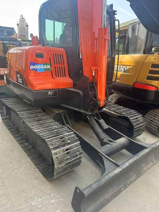 2020 Doosan DX60 crawler excavator, front three-quarter view 2020 Doosan DX60 crawler excavator, front three-quarter view