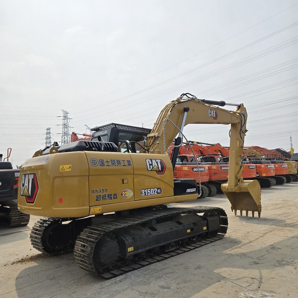 2021 Caterpillar 315D2GC crawler excavator, rear three-quarter view