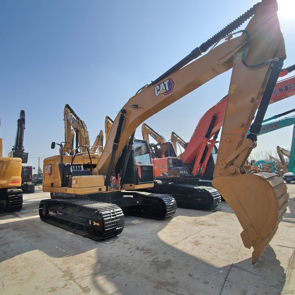 2024 Caterpillar 320GC crawler excavator, side profile view