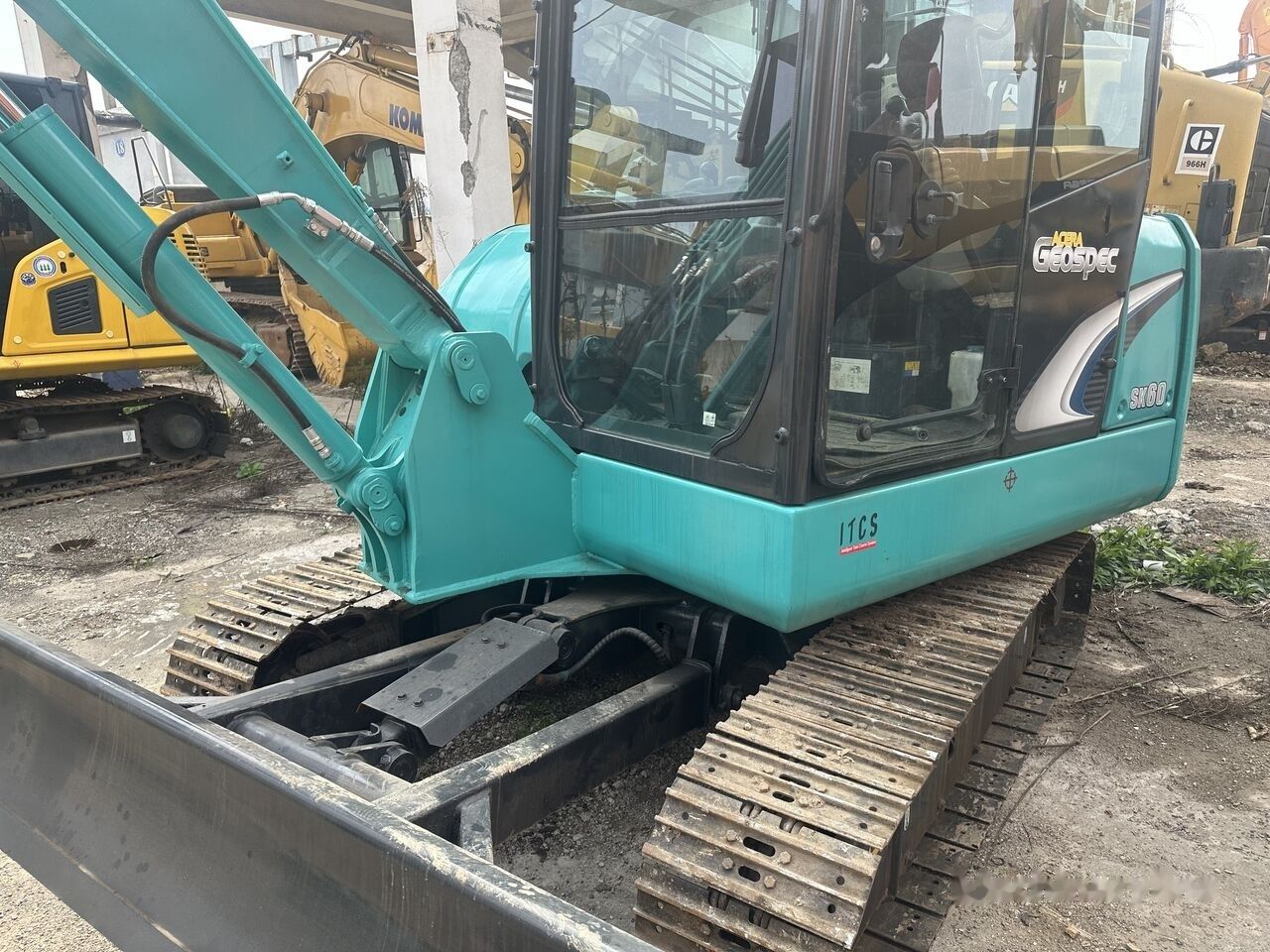 Kobelco SK60 mini excavator, side view
