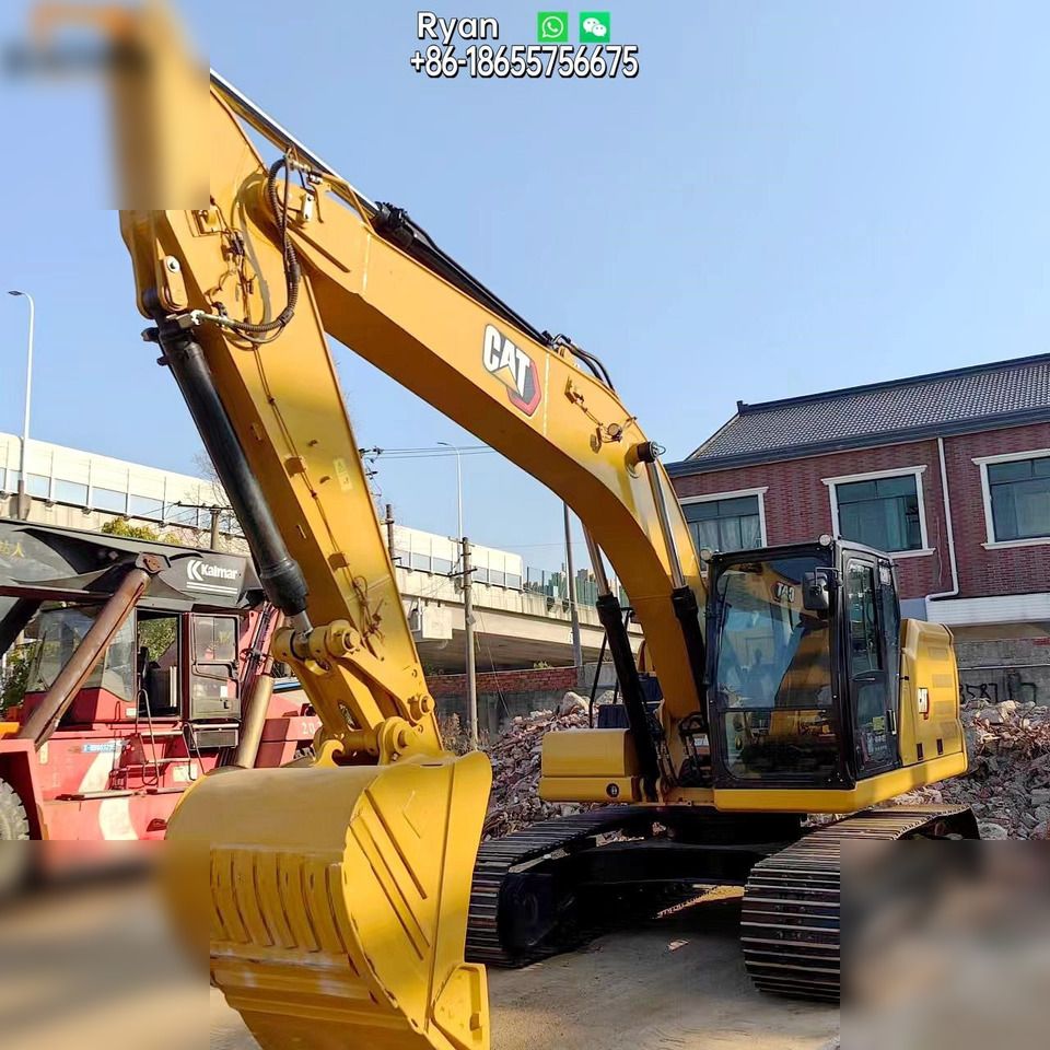 2021 Caterpillar 320 crawler excavator, front three-quarter view