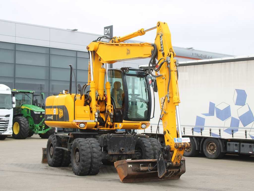 2015 JCB JS145W wheel excavator, front three-quarter view 2015 JCB JS145W wheel excavator, front three-quarter view