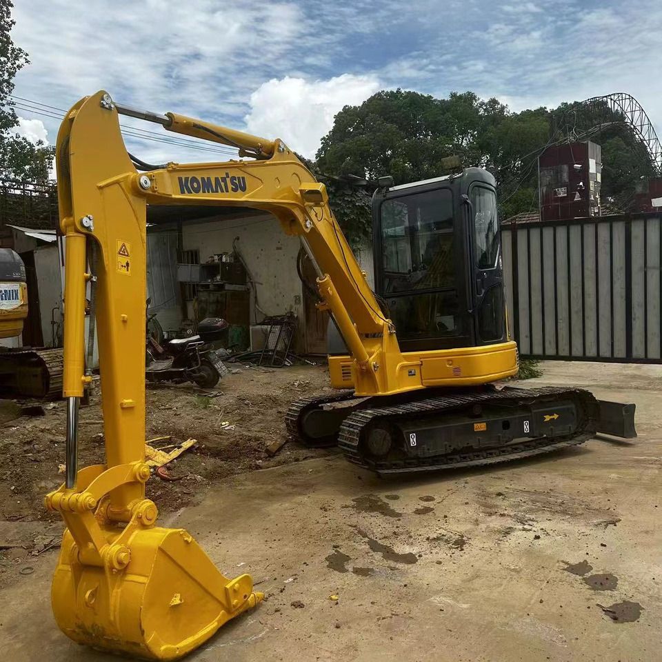 Komatsu PC-55MR mini excavator, side view Komatsu PC-55MR mini excavator, side view