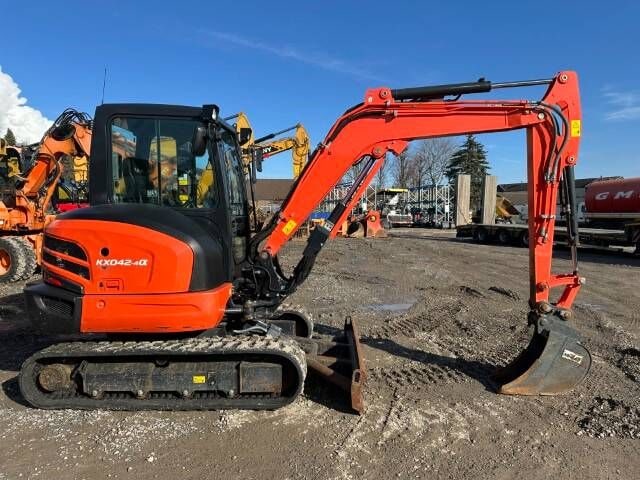 2023 Kubota KX042-4A mini excavator, side view 2023 Kubota KX042-4A mini excavator, side view