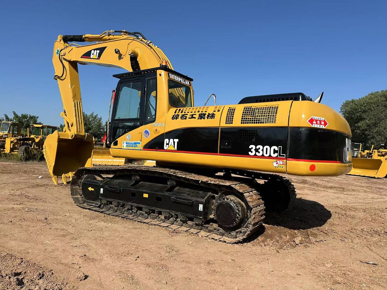 2020 Caterpillar 330CL crawler excavator, rear three-quarter view 2020 Caterpillar 330CL crawler excavator, rear three-quarter view