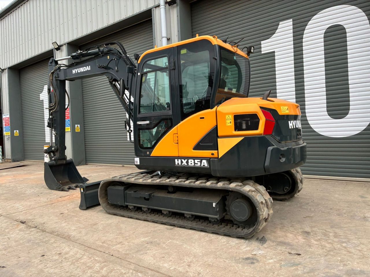 2023 Hyundai HX85A mini excavator, rear three-quarter view 2023 Hyundai HX85A mini excavator, rear three-quarter view