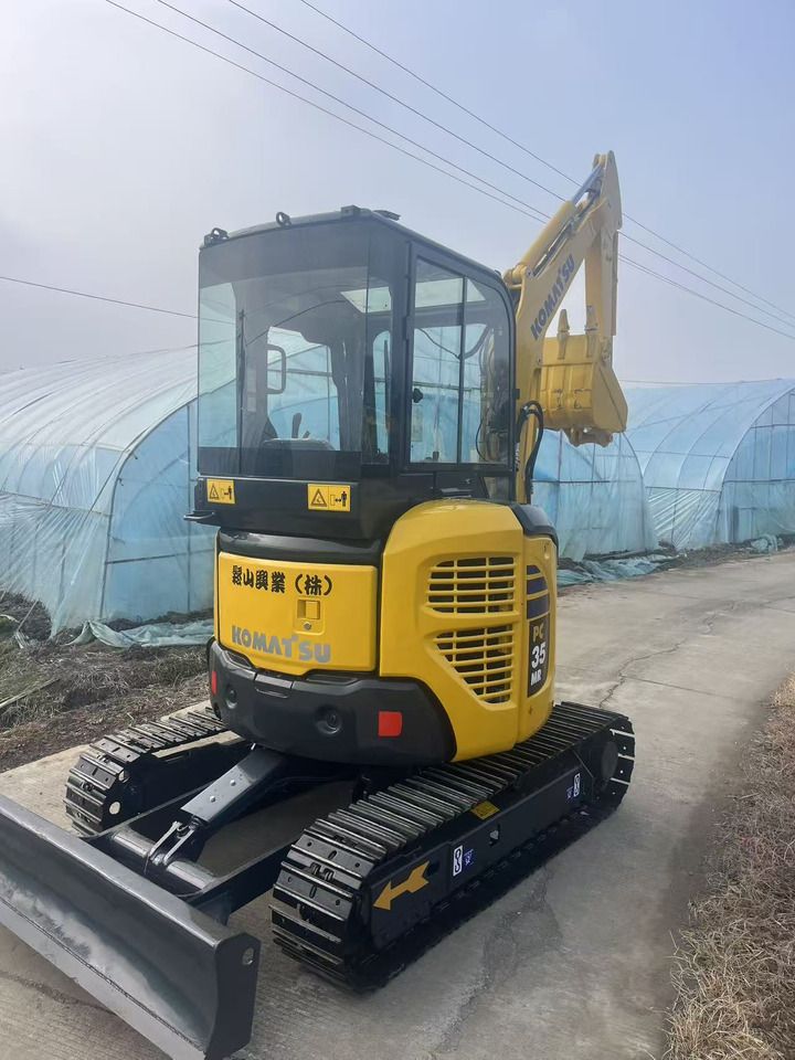 2024 Komatsu PC35MR mini excavator, front three-quarter view 2024 Komatsu PC35MR mini excavator, front three-quarter view