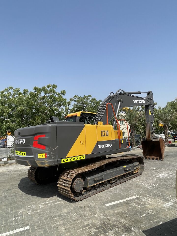 2025 Volvo EC210 crawler excavator, rear three-quarter view