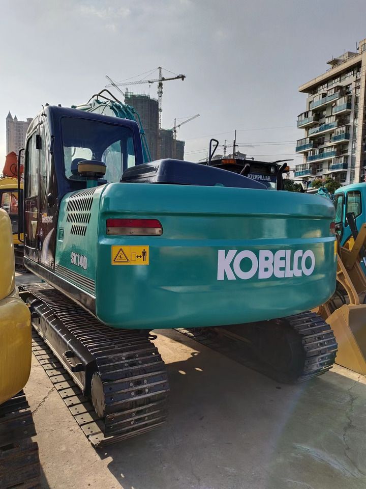 2018 Kobelco SK140LC-8 crawler excavator, rear three-quarter view 2018 Kobelco SK140LC-8 crawler excavator, rear three-quarter view