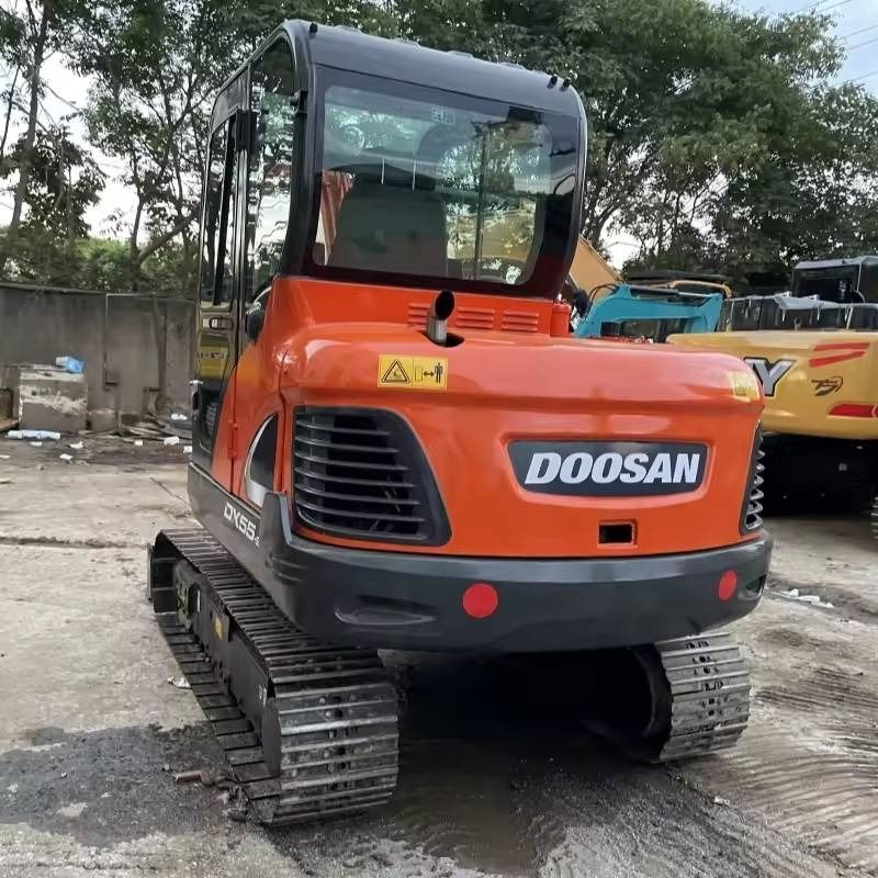 2023 Doosan DX55-9C mini excavator, rear three-quarter view 2023 Doosan DX55-9C mini excavator, rear three-quarter view