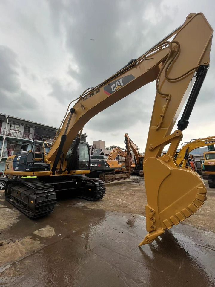 2023 Caterpillar 336D2 crawler excavator, low-angle side view