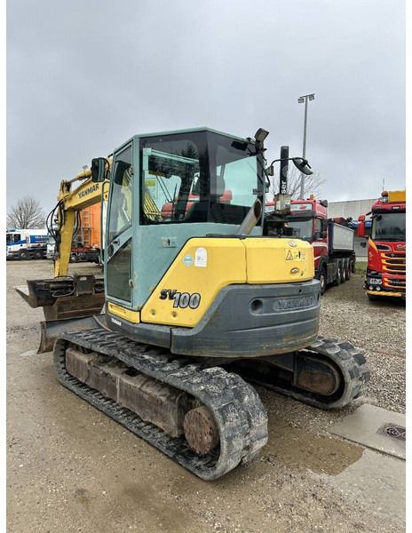 2014 Yanmar SV 100 mini excavator, rear three-quarter view 2014 Yanmar SV 100 mini excavator, rear three-quarter view
