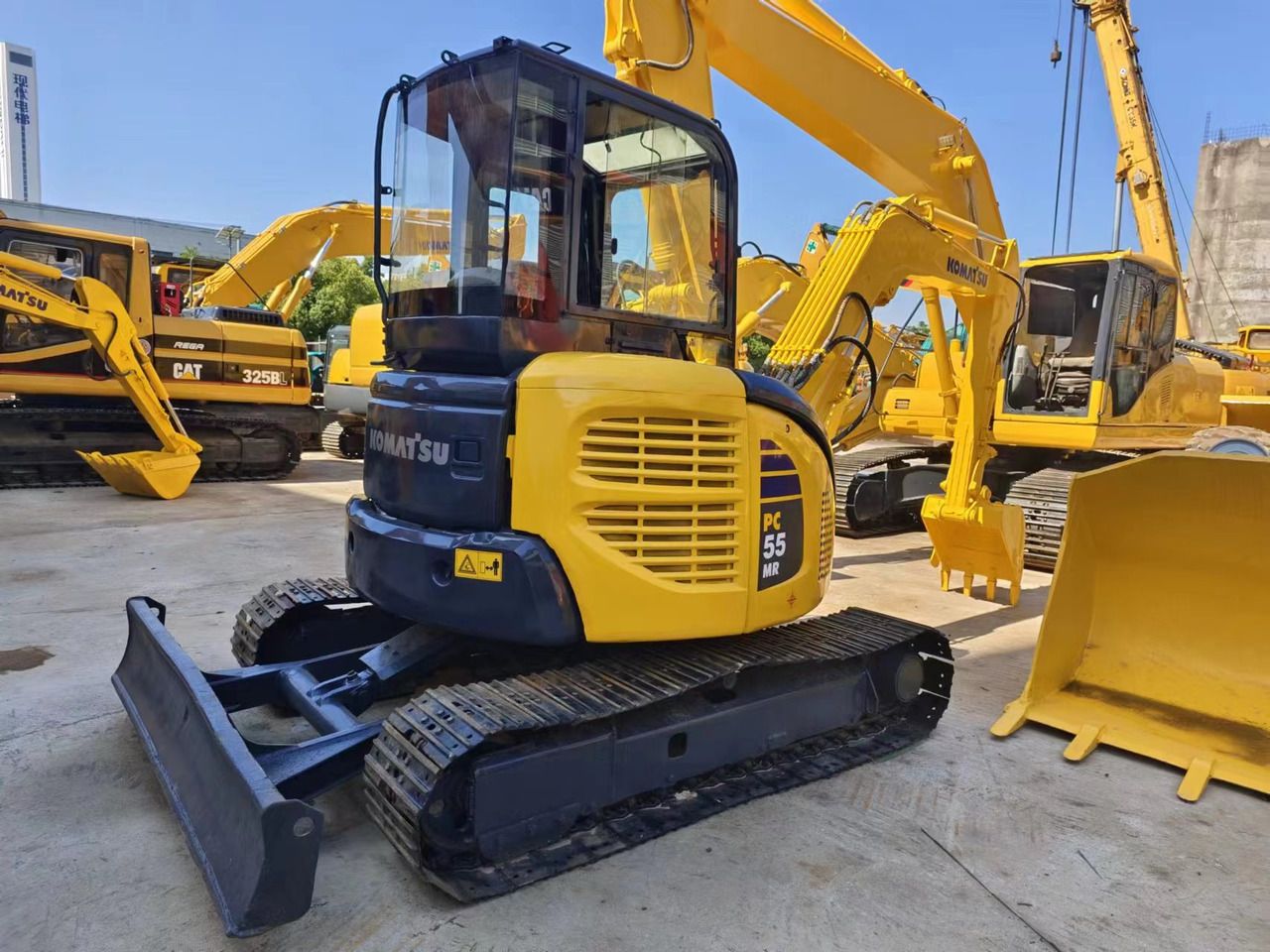 2018 Komatsu PC-55MR mini excavator, rear three-quarter view