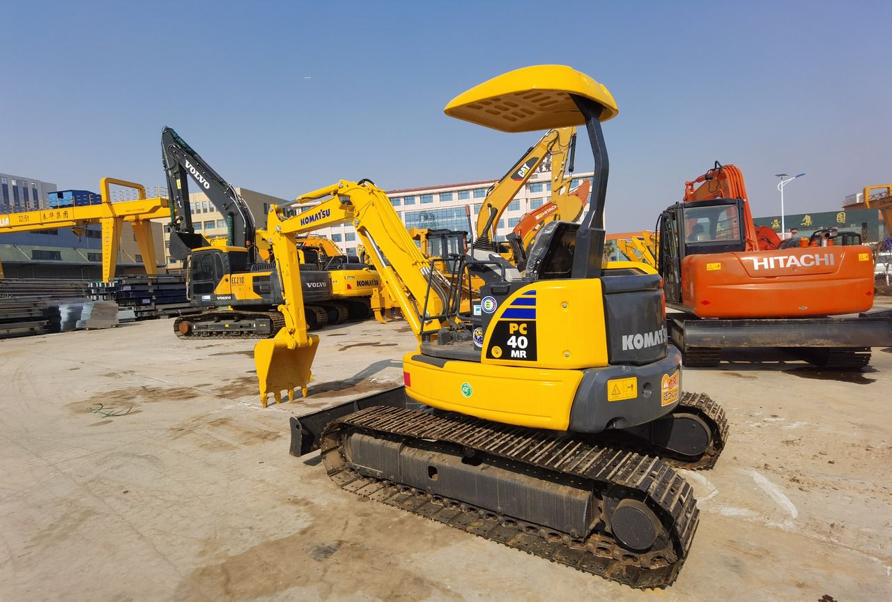 2022 Komatsu PC40MR mini excavator, rear three-quarter view 2022 Komatsu PC40MR mini excavator, rear three-quarter view