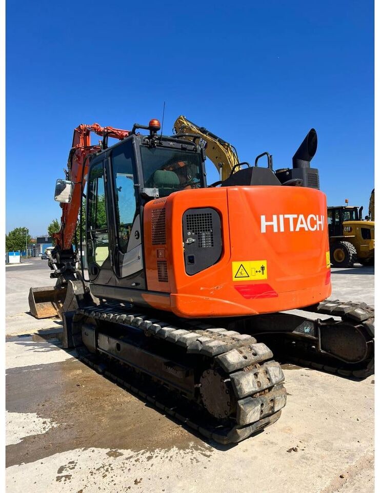 2019 Hitachi ZX135US-6 crawler excavator, rear three-quarter view