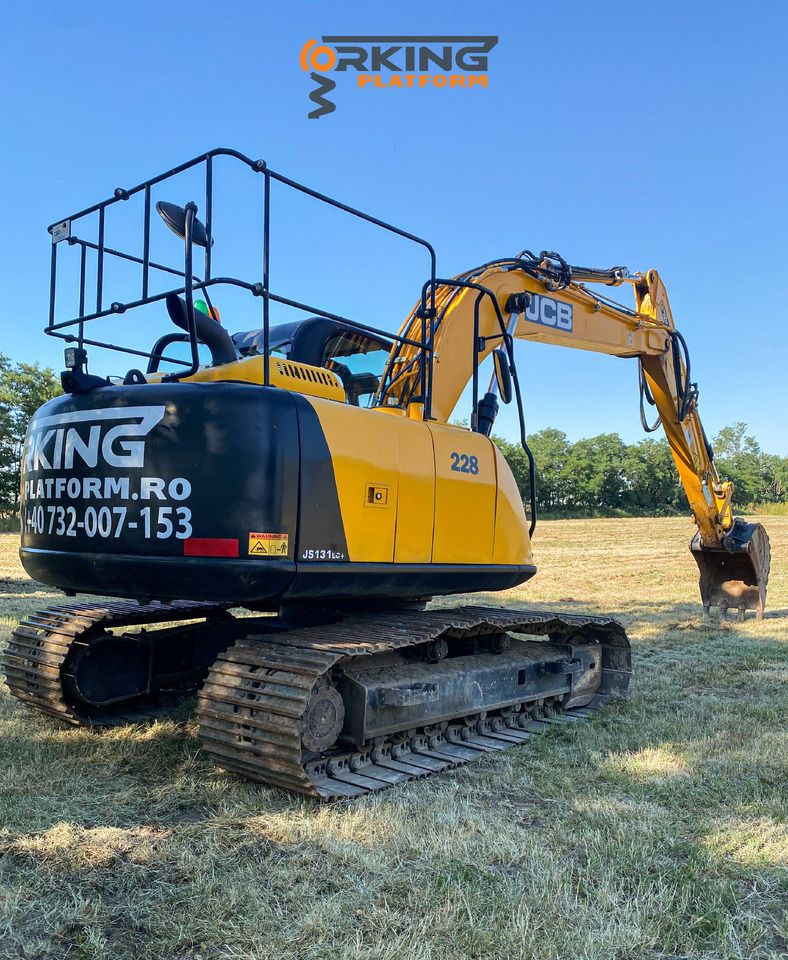 2019 JCB JS131LC excavator rear three-quarter view
