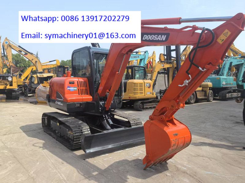 2024 Doosan DX60 mini excavator, side view 2024 Doosan DX60 mini excavator, side view