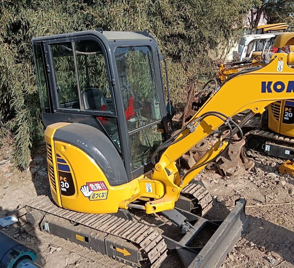 Komatsu PC30MR mini excavator, rear three-quarter view