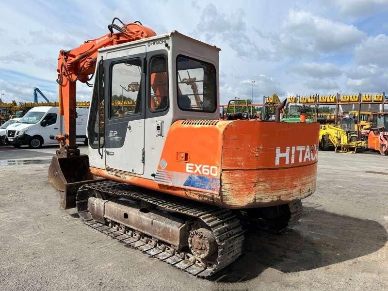 1990 Hitachi EX60 crawler excavator, rear three-quarter view 1990 Hitachi EX60 crawler excavator, rear three-quarter view