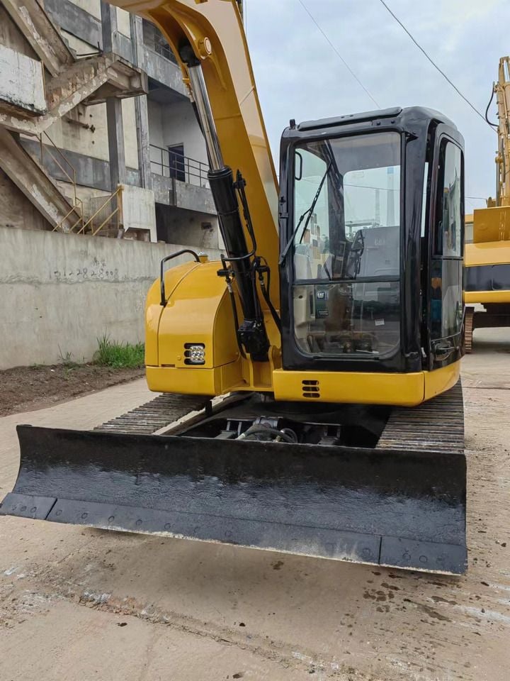 2022 Caterpillar 308D mini excavator front view with blade