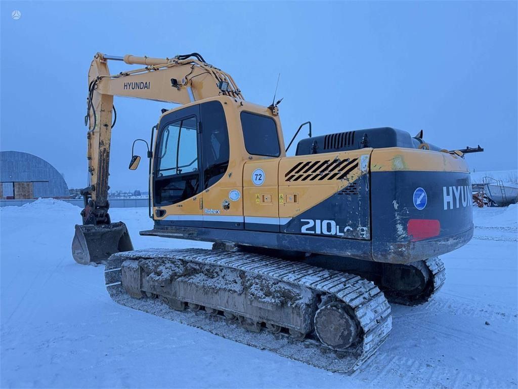 2011 Hyundai R210LC-9 crawler excavator, rear three-quarter view 2011 Hyundai R210LC-9 crawler excavator, rear three-quarter view