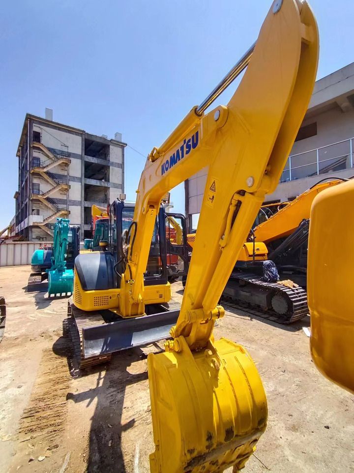 2018 Komatsu PC-55MR mini excavator, front three-quarter view 2018 Komatsu PC-55MR mini excavator, front three-quarter view