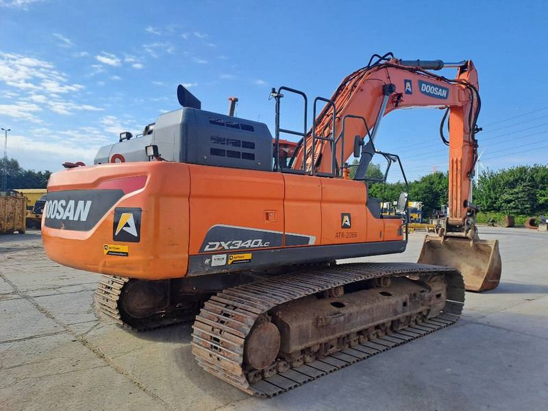 2018 Doosan DX340LC crawler excavator, rear three-quarter view 2018 Doosan DX340LC crawler excavator, rear three-quarter view