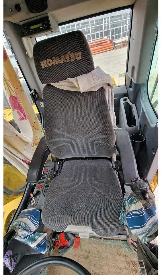 Komatsu PW148-8 Wheel Excavator interior cab view Komatsu PW148-8 Wheel Excavator interior cab view