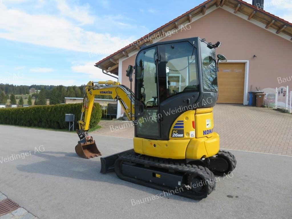 2023 Komatsu PC26 MR-5 mini excavator, front three-quarter view