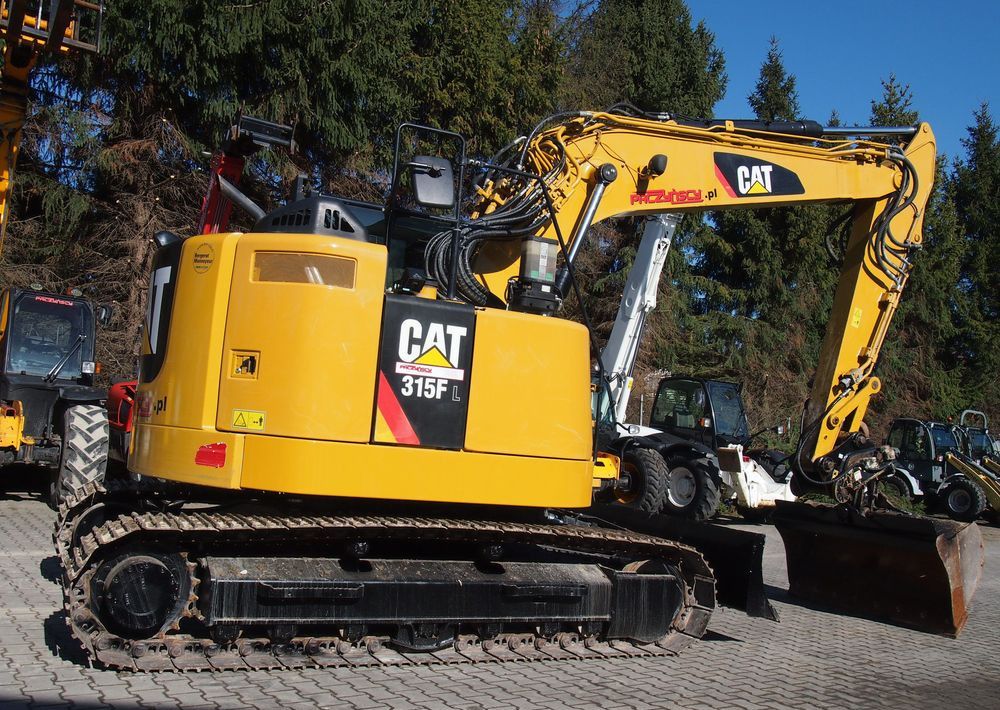 2018 Caterpillar 315FL crawler excavator, side view 2018 Caterpillar 315FL crawler excavator, side view