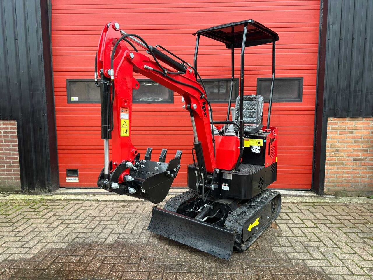 2024 JPC HT-12 mini excavator, front three-quarter view
