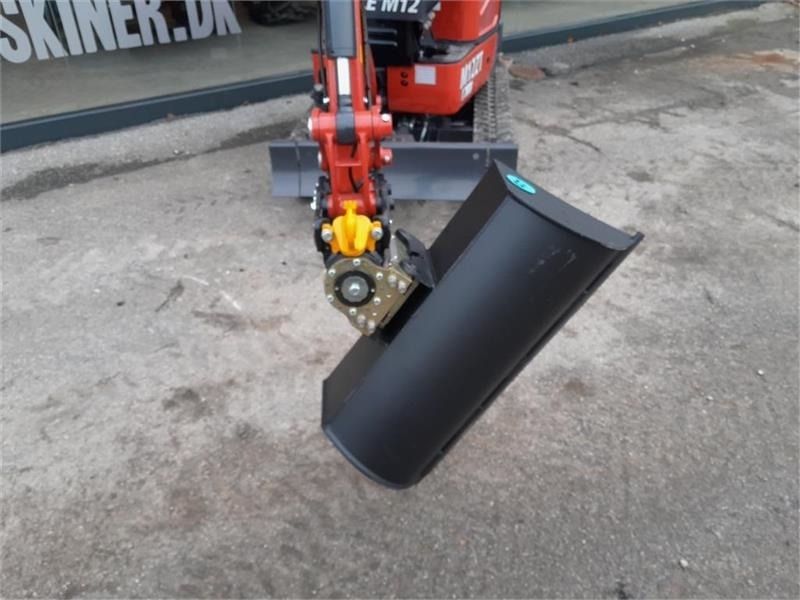 Mole M12 mini excavator, front view with bucket Mole M12 mini excavator, front view with bucket