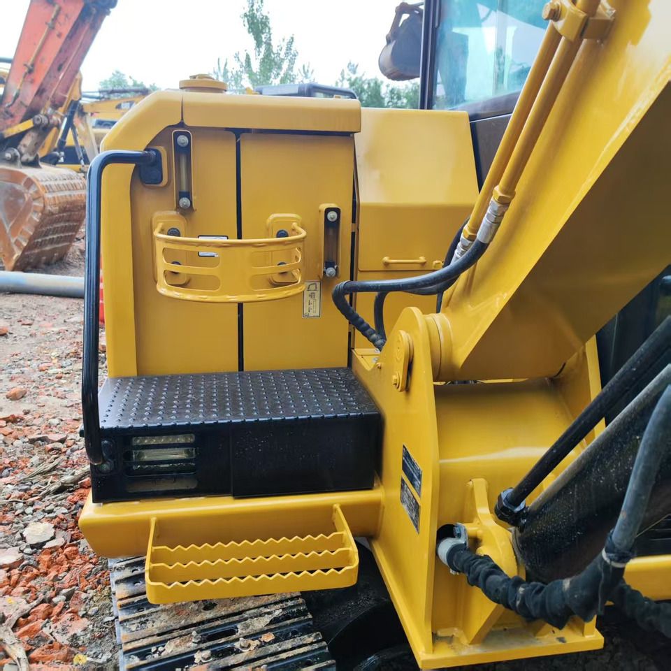 2018 Caterpillar 303.5E mini excavator side view of cab and step area 2018 Caterpillar 303.5E mini excavator side view of cab and step area
