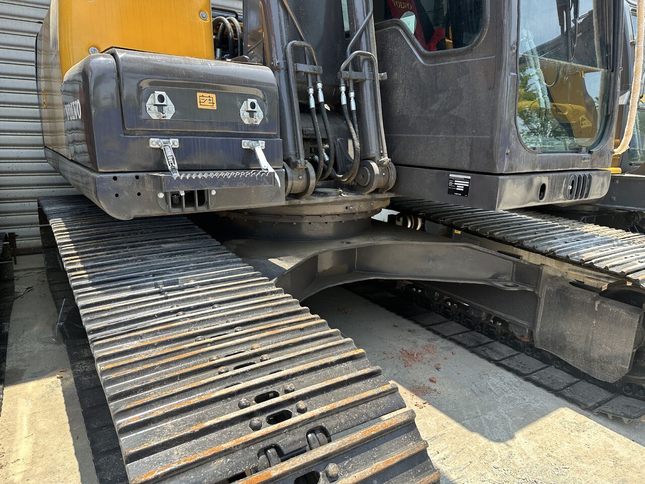 2023 Volvo EC140 crawler excavator side view of the undercarriage and cab 2023 Volvo EC140 crawler excavator side view of the undercarriage and cab