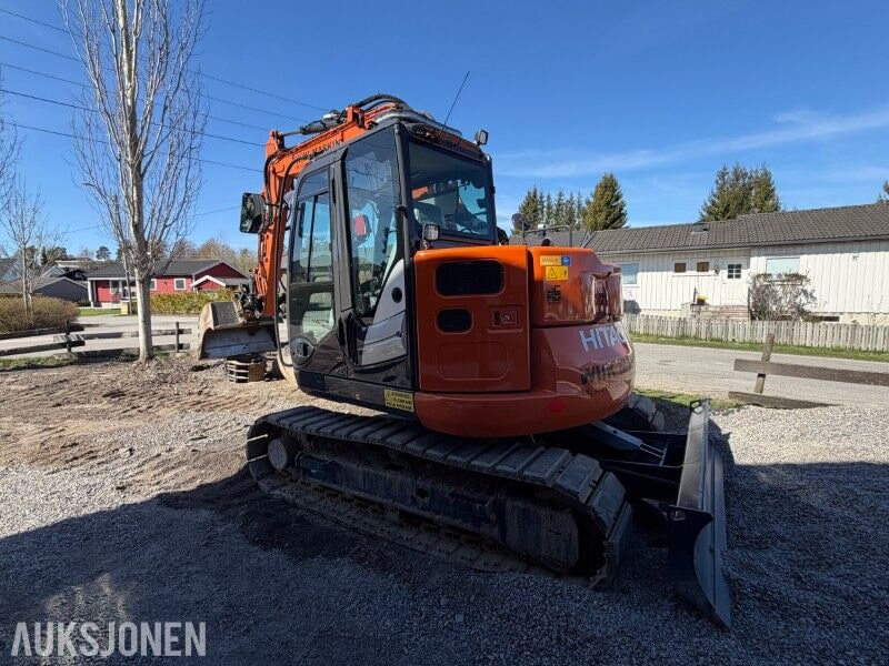 2023 Hitachi ZX85US-6 excavator, rear three-quarter view