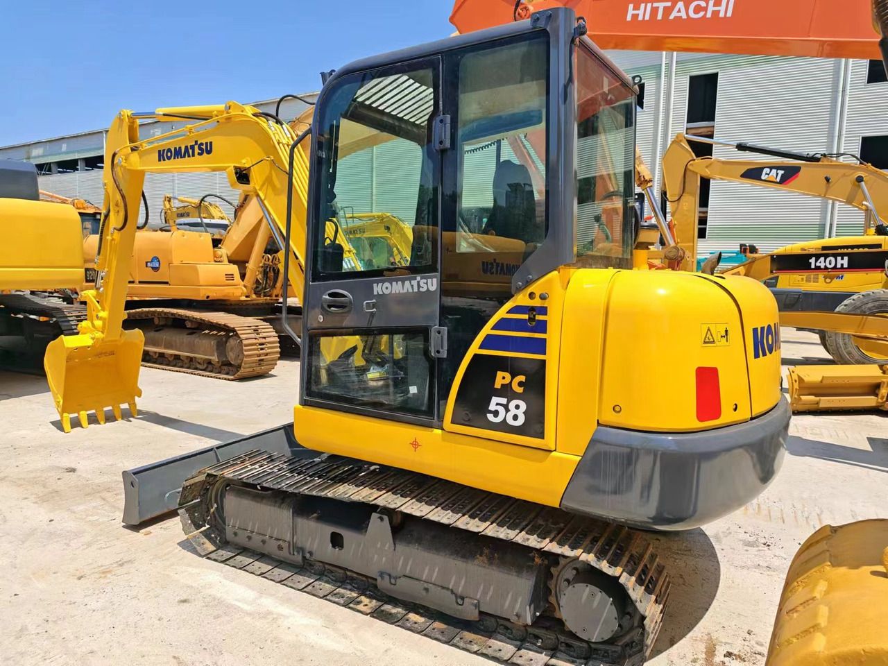 2019 Komatsu PC58 mini excavator, rear three-quarter view