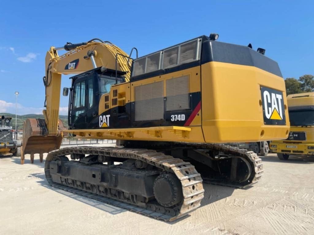 2012 Caterpillar 374D crawler excavator, rear three-quarter view 2012 Caterpillar 374D crawler excavator, rear three-quarter view