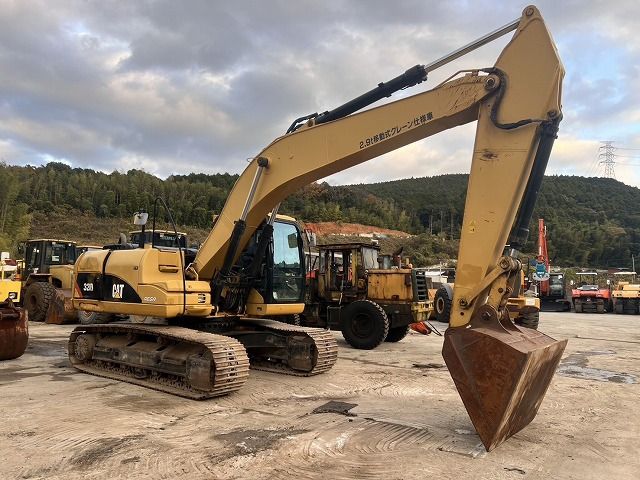 Escavatore cingolato Caterpillar 320D del 2012, vista laterale Escavatore cingolato Caterpillar 320D del 2012, vista laterale