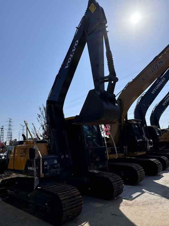 2023 Volvo EC140 crawler excavator, side profile view 2023 Volvo EC140 crawler excavator, side profile view