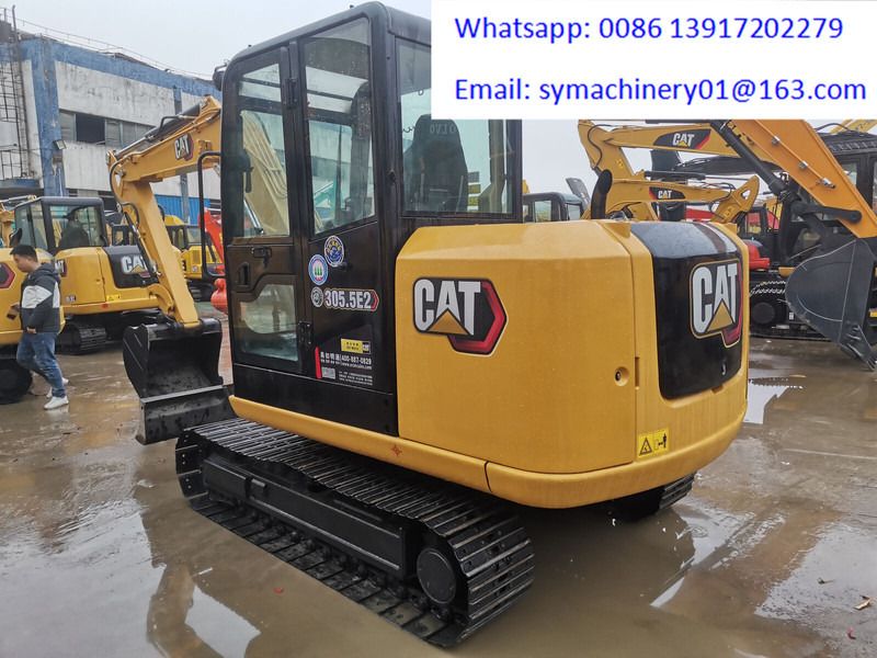2023 Caterpillar 305.5E2 crawler excavator, rear three-quarter view